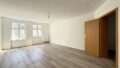 Wohnzimmer mit Balkon